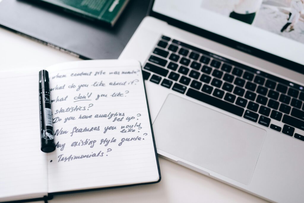 Marker On top of a Notebook